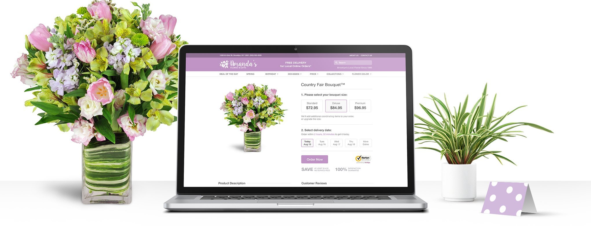 A floral arrangement in glass vase and house plant stand at each side of a laptop displaying a Lovingly Store page.